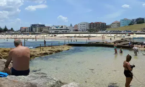 People cool off in the water at Bondi Beach in Sydney on Tuesday as the city braced itself for the hottest December night since 1972. Photo: Joel Carrett, AAP