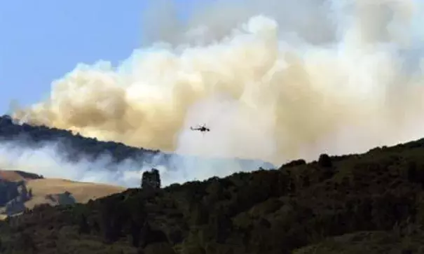 A wildfire burning for nearly two months on California's Central Coast has surpassed $200 million in firefighting costs, becoming the costliest to fight in U.S. history. Data from the National Interagency Fire Center released Monday, Sept. 19, 2016, says the so-called Soberanes fire has cost $206.7 million to fight so far. Photo: David Royal / The Monterey County Herald via AP