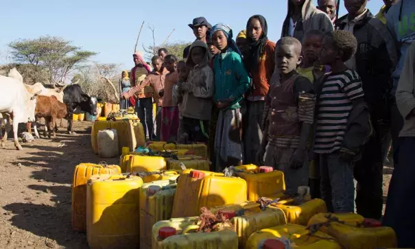 In February 2016, villagers gather at the Ula Arba water point, in Ziway Dugda Woreda, Arsi zone Oromia region, Ethiopia. Photo: Charlotte Cans, OCHA