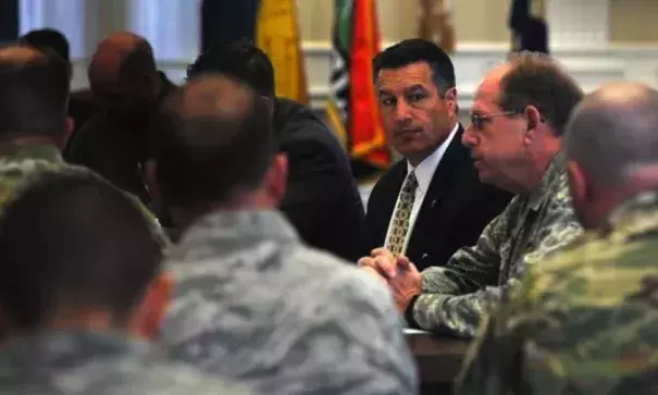 Governor Brian Sandoval, middle, listens to Brigadier General William Burks of the Nevada National Guard, right, speak during a briefing on possible spring flooding at the Old Assembly Chambers in the Nevada State Capital Building in Carson City on April 13, 2017. (Photo: Jason Bean, Reno Gazette Journal, USA Today Network