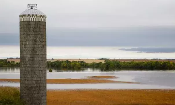 A dairy farm is surrounded by floodwaters on Thursday, Sept. 22, 2016, outside of Clarksville. Photo: Brian Powers, The Register