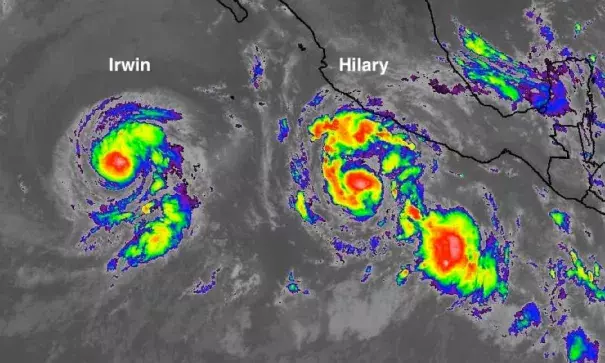 Infrared satellite image of Tropical Storm Irwin (left) and Hurricane Hilary (right) in the Northeast Pacific at 11:00 am EDT Monday, July 24, 2017. The two cyclones will interact with each other in an unusual way later this week.