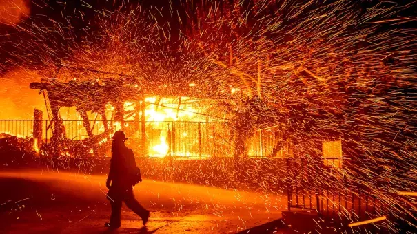 A new wildfire forced people to evacuate their homes in the middle of the night in San Bernardino, California.