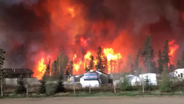 A trailer park engulfed in flames near Fort McMurray, Alta. Tuesday, May 3, 2016. Photo: Breanna Karstens-Smith, CTV News