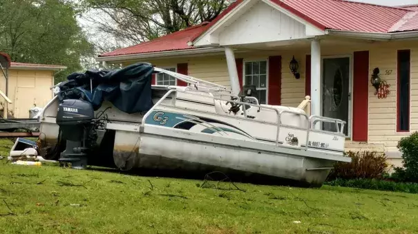 A boat sits in the front yard of a home in Henry County, Alabama, after a suspected tornado touched down in the area on April 5, 2017. Photo: Michele W. Forehand, Dothan Eagle via AP