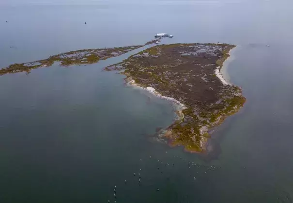 An aerial view of the lodge on Fox Island. The Chesapeake Bay Foundation's Fox Island Environmental Education Program will be closing for good because of rising sea levels and erosion. Credit: Ricky Carioti/The Washington Post