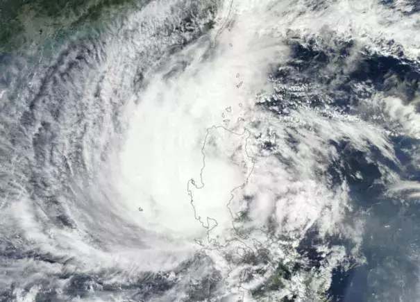 MODIS image of Typhoon Koppu over Luzon Island in the Philippines as seen from NASA's Terra satellite on Sunday, October 18, 2015. At the time, Koppu was a Category 2 storm with 105 mph winds. Image credit: NASA.