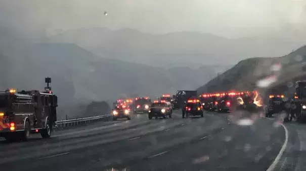 Rain falls after lightning strikes sparked fires on Interstate 5. Photo: L.A. County Sheriff's Department