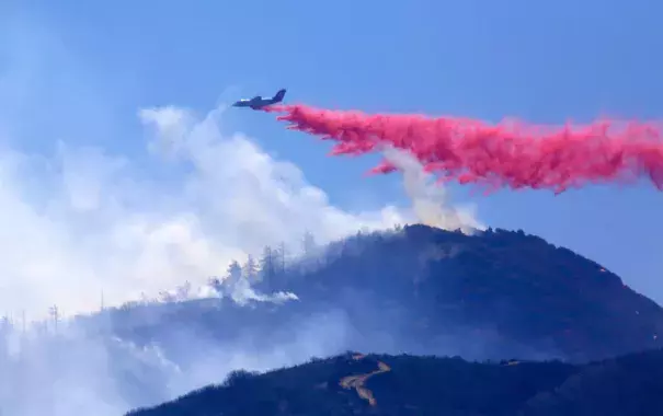 The Pilot fire continues to grow in the mountains of San Bernardino County. Photo: Los Angeles Times