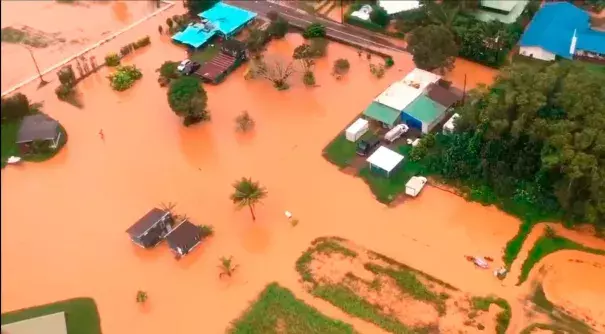 Floodwaters on the Hawaiian island of Kauai turned orange, a sign of the high iron content in the volcanic soil. Photo: Brandon Verdura, Associated Press