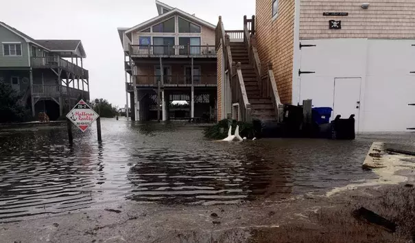 Floodwaters surround homes in North Carolina’s Outer Banks, where Hurricane Maria brought a 2’ storm surge on Tuesday, Sept. 26, 2017. Photo: Ben Finley, AP