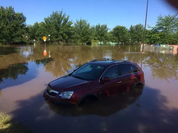 A car sits in the parking lot of Midland's downtown farmers' market. Photo: Stve Carmody, Michigan Radio