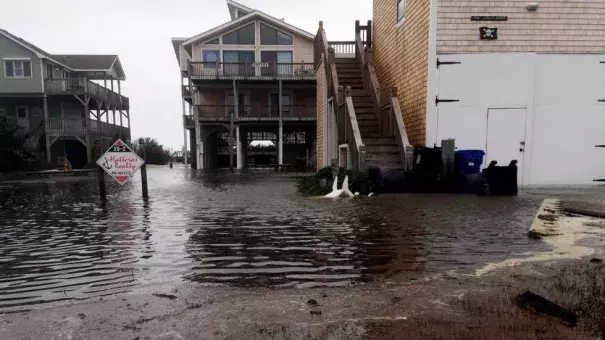 Floodwaters surround homes as Hurricane Maria moves closer to North Carolina's Outer Banks on Tuesday, Sept. 26, 2017. Thousands of visitors abandoned their vacation plans and left the area as the hurricane moved northward in the Atlantic, churning up surf and possible flooding. Photo: Ben Finley, AP