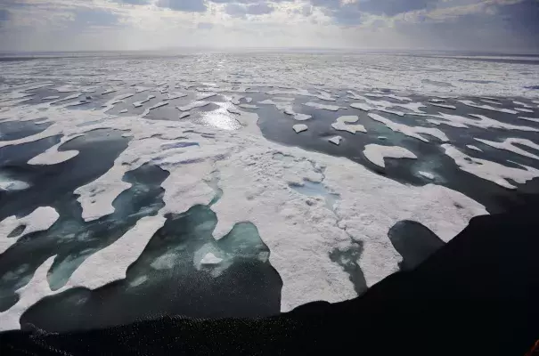 Sea ice melts on the Franklin Strait along the Northwest Passage in the Canadian Arctic Archipelago, Saturday, July 22, 2017. Because of climate change, more sea ice is being lost each summer than is being replenished in winters. Less sea ice coverage also means that less sunlight will be reflected off the surface of the ocean in a process known as the albedo effect. The oceans will absorb more heat, further fueling global warming. Photo: David Goldman, AP