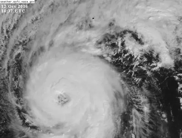 Visible satellite image of Hurricane Nicole as of 1437Z (10:37 am EDT) Wednesday, October 12, 2016. Bermuda is visible as the black speck at center top. Image: NASA/MSFC Earth Science Office