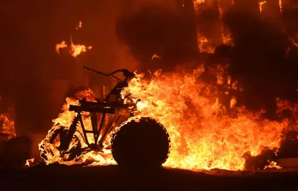 An early July heat wave dried out scrub and underbrush, fueling wildfires across California and the West that destroyed homes and forced thousands of people to evacuate. Photo: Josh Edelson, AFP/Getty