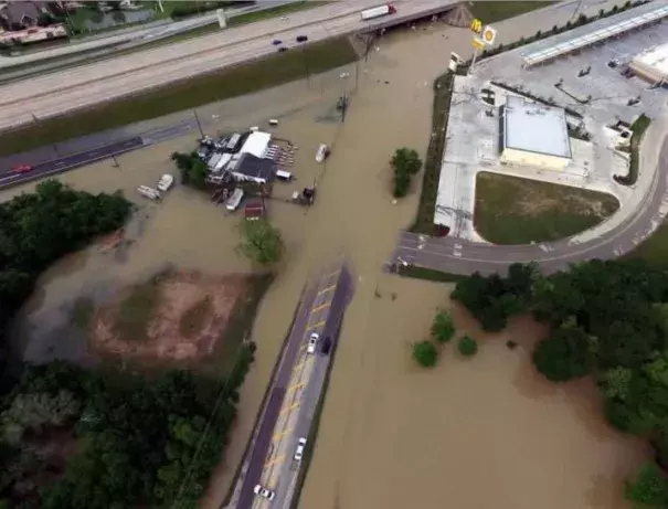 Flood waters cover the area of FM 1463 at IH-10 in Fort Bend County, Texas, U.S. April 19, 2016. Photo: Texas DOT-Houston, Handout via REUTERS