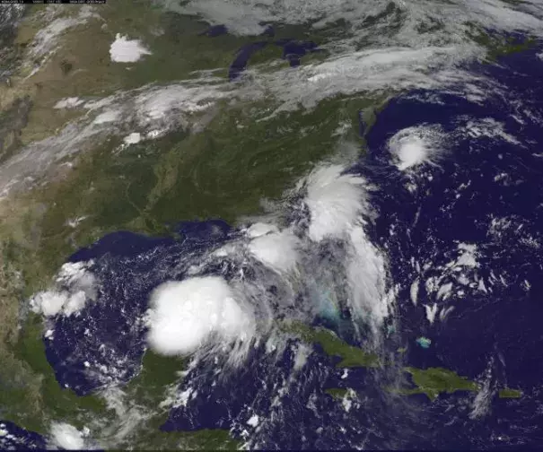 Image: Two Tropical Depressions are shown over the Gulf of Mexico and along the Carolina coast of the United States in this GOES East satellite image captured August 31, 2016. Image: NOAA