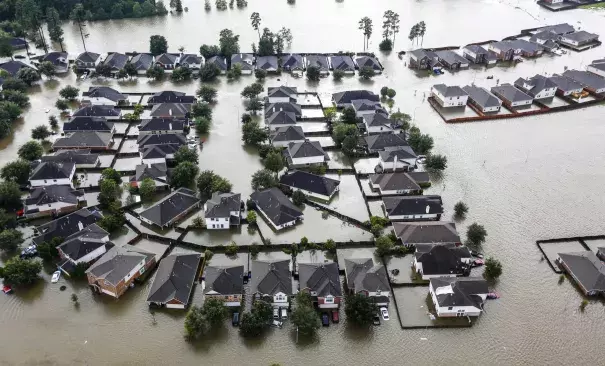 A neighborhood is inundated by floodwaters from Tropical Storm Harvey on Tuesday, Aug. 29, 2017, in Spring. ( Brett Coomer / Houston Chronicle ) Photo: Brett Coomer, Staff / © 2017 Houston Chronicle Photo: Brett Coomer, Staff IMAGE 1 OF 76 A neighborhood is inundated by floodwaters from Tropical Storm Harvey on Tuesday, Aug. 29, 2017, in Spring. Photo: Brett Coomer, Houston Chronicle