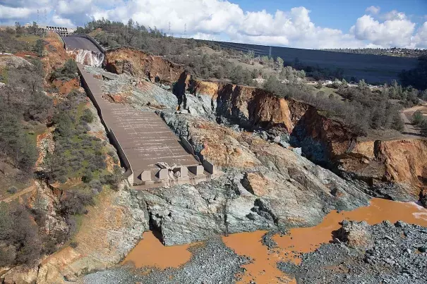 Damage to the spillway at the Oroville Dam is depicted in a photo released by the California Department of Water Resources on Feb. 28, 2017. Credit: CA Dept of Water Resources
