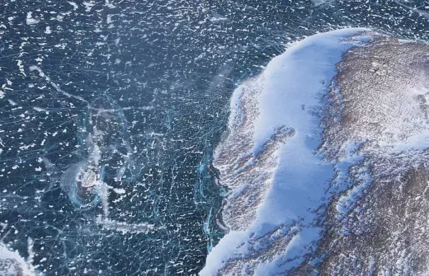 Photo from eight-hour NASA Operation IceBridge research flight monitors Arctic ice loss over Greenland's ice sheet. Photo: Mario Tama, Getty Images