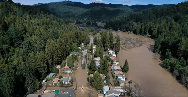 A flooded neighborhood in Guerneville, California after the Russian River crested over flood stage. Credit: Justin Sullivan/Getty Images.