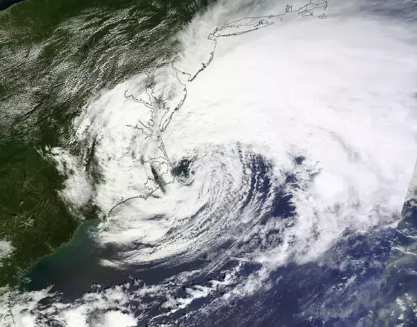 MODIS visible satellite image of Hermine taken at 12:30 pm EDT September 3, 2016. At the time, Hermine was a post-tropical cyclone with top sustained winds of 70 mph. Note the asymmetric shape of the storm, with a comma-like configuration, instead of circular. Image: NASA