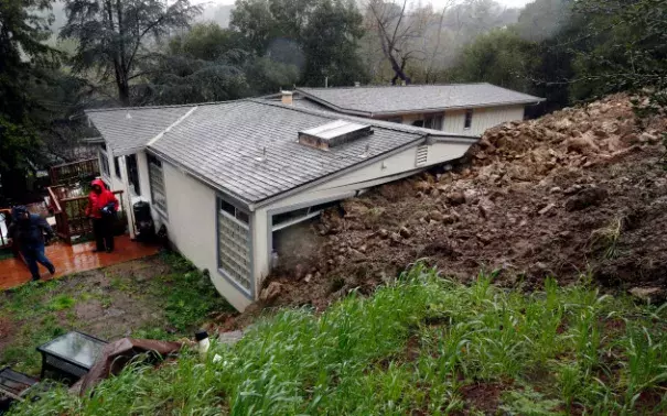 Mud and rocks hit the rear of a home on Van Tassel Lane in Orinda, Calif., resulting in the county red-tagging the home, deeming it unsafe to be in the home on Thursday, Feb. 9, 2017. Photo: Laura A. Oda, Bay Area News Group