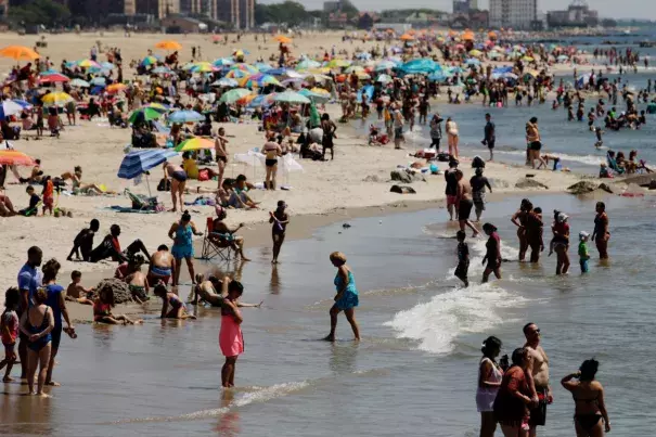 New Yorkers enjoy the beach in Coney Island. Photo: EPA