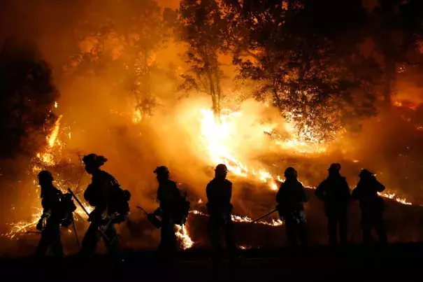 Firefighters battle the Valley Fire near Middletown, California, on September 13. Stephen Lam / Getty Images