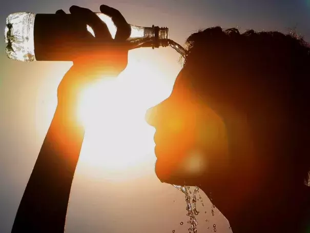 A man cools himself down. Photo: Rex Features