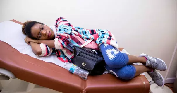 Unique Robinson, 22, of Hollywood, Fla., waits to be seen by her obstetrician, Dr. Aaron Elkin. Photo: Joshua Prezant for The New York Times