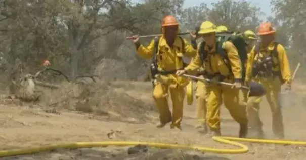 Firefighters battle the Goose Fire near Prather in California on Monday, August 1, 2016. Photo: CBS / KGPE