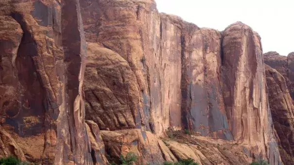 Rafters float down the Colorado River near Moab, Utah. Rivers are drying up, popular mountain recreation spots are closing and water restrictions are in full swing as a persistent drought intensifies its grip on pockets of the American Southwest. Credit: Dan Elliott, AP