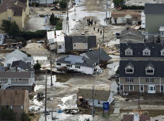 An aerial view shows destroyed homes Oct. 31 after Hurricane Sandy came ashore in Seaside Heights, N.J. Recovery efforts after the widespread devastation and destruction caused by the super storm could be among the most expensive in United States history. Sandy has claimed at least 40 lives in the United States as of Oct. 31 and one death in Canada. Photo: Steve Nesius, CNS photo, Reuters)