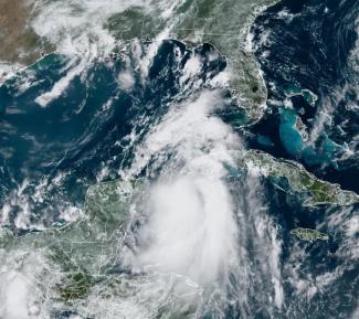 Visible satellite image of Tropical Storm Idalia at 11:50 a.m. EDT Aug. 28, 2023. (Image credit: NOAA/RAMMB/Colorado State University) via Yale Climate Connections
