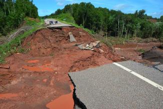 A section of Wisconsin Highway 13 is washed out after heavy rains, south of Highbridge in Ashland, Wis., on July 12. Photo: Jeff Peters / AP