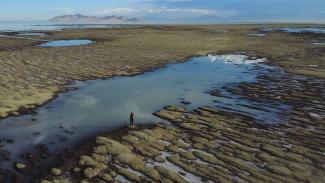 Dry lake bed is exposed at the Great Salt Lake in September. (Credit: Rick Bowmer/AP)