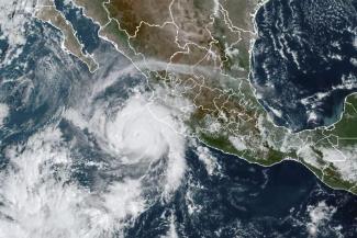 This satellite image taken at 15:30 UTC and provided by NOAA shows Hurricane Roslyn approaching the Pacific coast of Mexico, Saturday, Oct. 22, 2022. Roslyn grew to Category 4 force on Saturday as it headed for a collision with Mexico’s Pacific coast, likely north of the resort of Puerto Vallarta. (Credit: NOAA via AP)