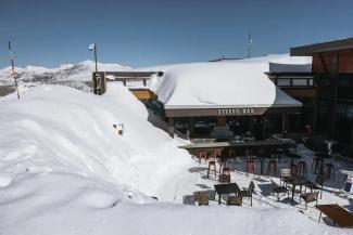 In this image provided by Mammoth Mountain, the ski resort is covered with snow in Mammoth Lakes, Calif., on March 16, 2023. The Mammoth Mountain ski resort in the Eastern Sierra said this has been its snowiest season on record, with 695 inches at the main lodge and 870 inches on the summit of the 11,053-foot peak, as of Tuesday, March 28, 2023. (Credit: Peter Morning/Mammoth Mountain via AP)