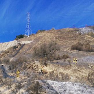Firefighters fighting the Cuesta fire. Image Credit: Sarah Stierch, Flickr