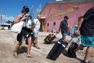 Residents evacuate from Pine Island, Fla., before Hurricane Ian made landfall in October 2022. (Credit: Joe Raedle/Getty Images)