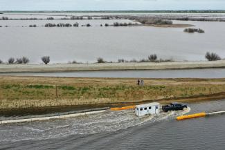 Flooding in Tulare County, near Alpaugh, California. (Credit: Patrick T. Fallon/Agence France-Presse — Getty Images)