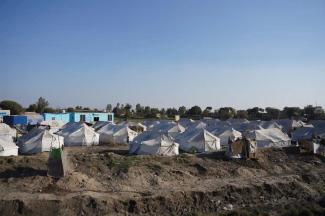 The tent city in Khairpur Nathan Shah, Dadu district, Pakistan, where Manzoor Ali and more than 50 families are still living in camps months after the floods. (Photograph Credit: Shah Meer Baloch)