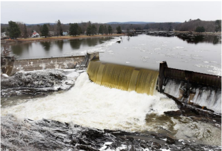 The Connecticut River flows over the Turners Falls Dam on Tuesday. Photo: Paul Franz, Recorder Staff