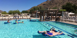 Hotel guests cool off at the pool at the JW Marriott Scottsdale Camelback Inn Resort and Spa in Paradise Valley, Ariz., on Sunday, June 19, 2016. States in the Southwest are in the midst of a summer heat wave as a high pressure ridge bakes Arizona, California and Nevada with extreme, triple-digit temperatures. Photo: Anna Johnson, AP