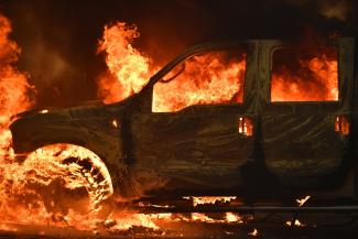 A truck burns on Main Street in the town of Lower Lake, Calif. on Sunday. Photo: Josh Edelson, AP