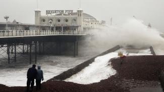 Waves crash onto the beach near Brighton Pier in England, in January 2007. Gale force winds and heavy rain brought disruption to large parts of the country. Severe weather events like this one may be linked to more frequent fluctuations in the polar jet stream, according to a new study. Photo: Peter Macdiarmid, Getty Images