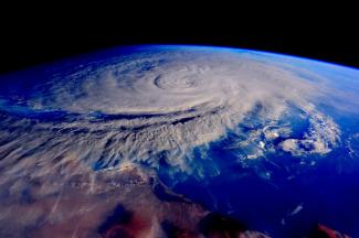 Tropical Cyclone Chapala as seen from the International Space Station at sunset on Halloween evening, October 31, 2015. At the time, Chapala was a Category 4 storm with 135 mph winds. The coast of Oman/Yemen is visible at the bottom of the image. Image: Commander Scott Kelly