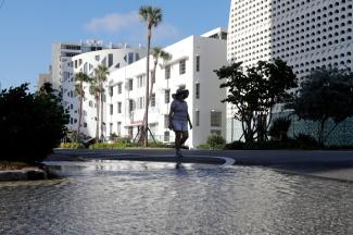 A flooded street in Miami Beach, Fla. So-called sunny-day flooding is happening more often. (Credit: Lynne Sladky/AP)